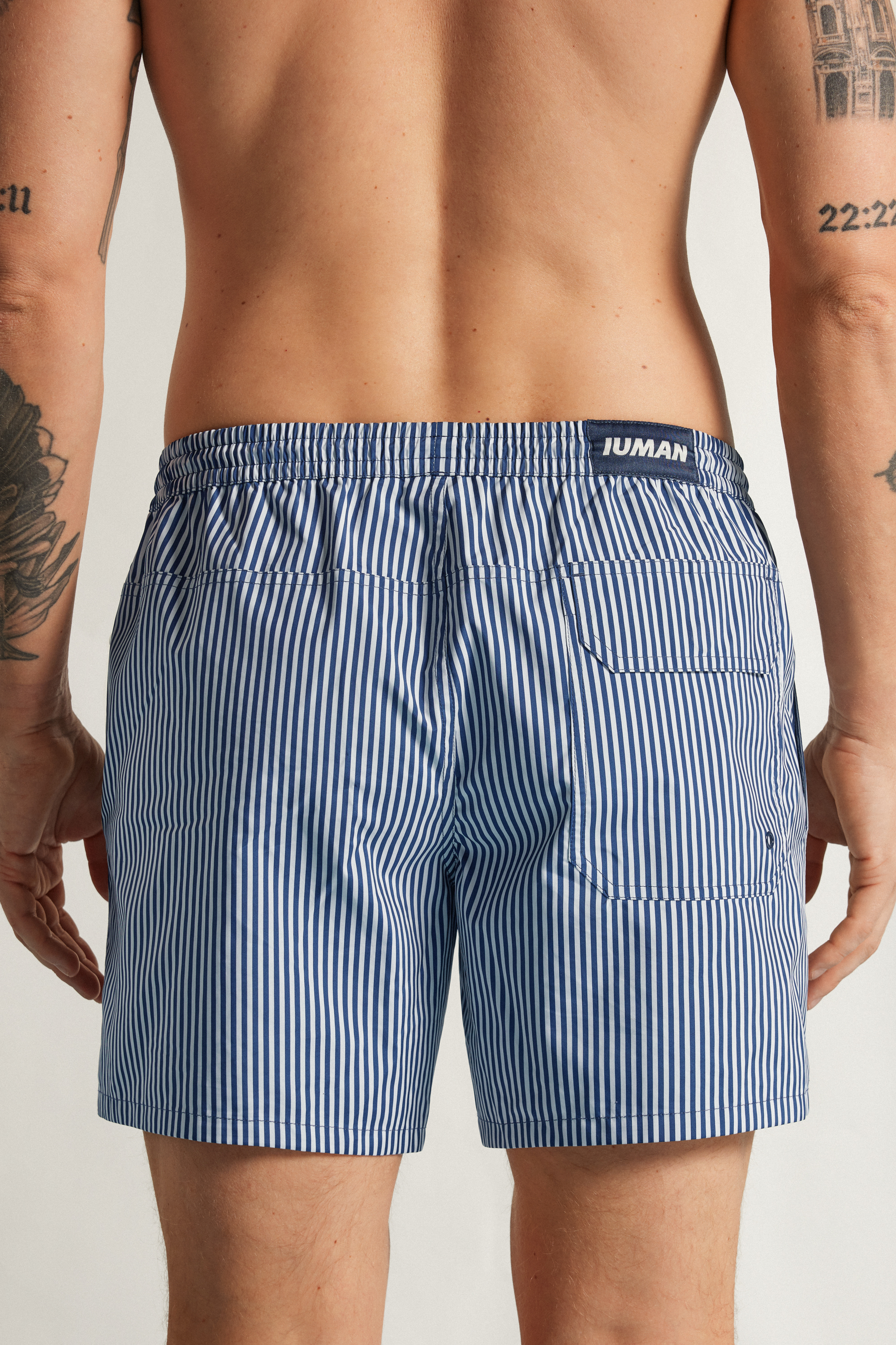 Alternative view of Reversible Striped White/Blue Swim Trunks