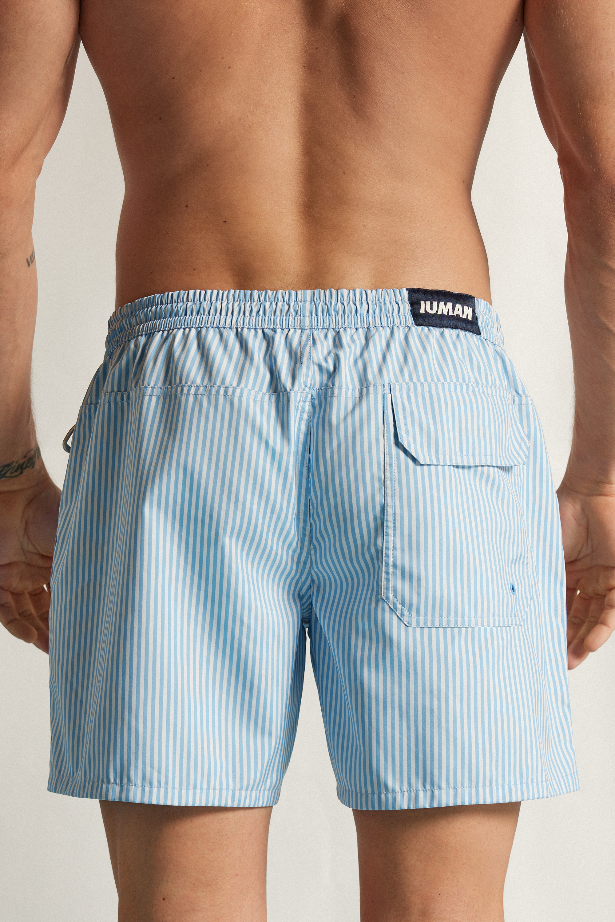 Alternative view of Reversible White/Light Blue Swim Trunks