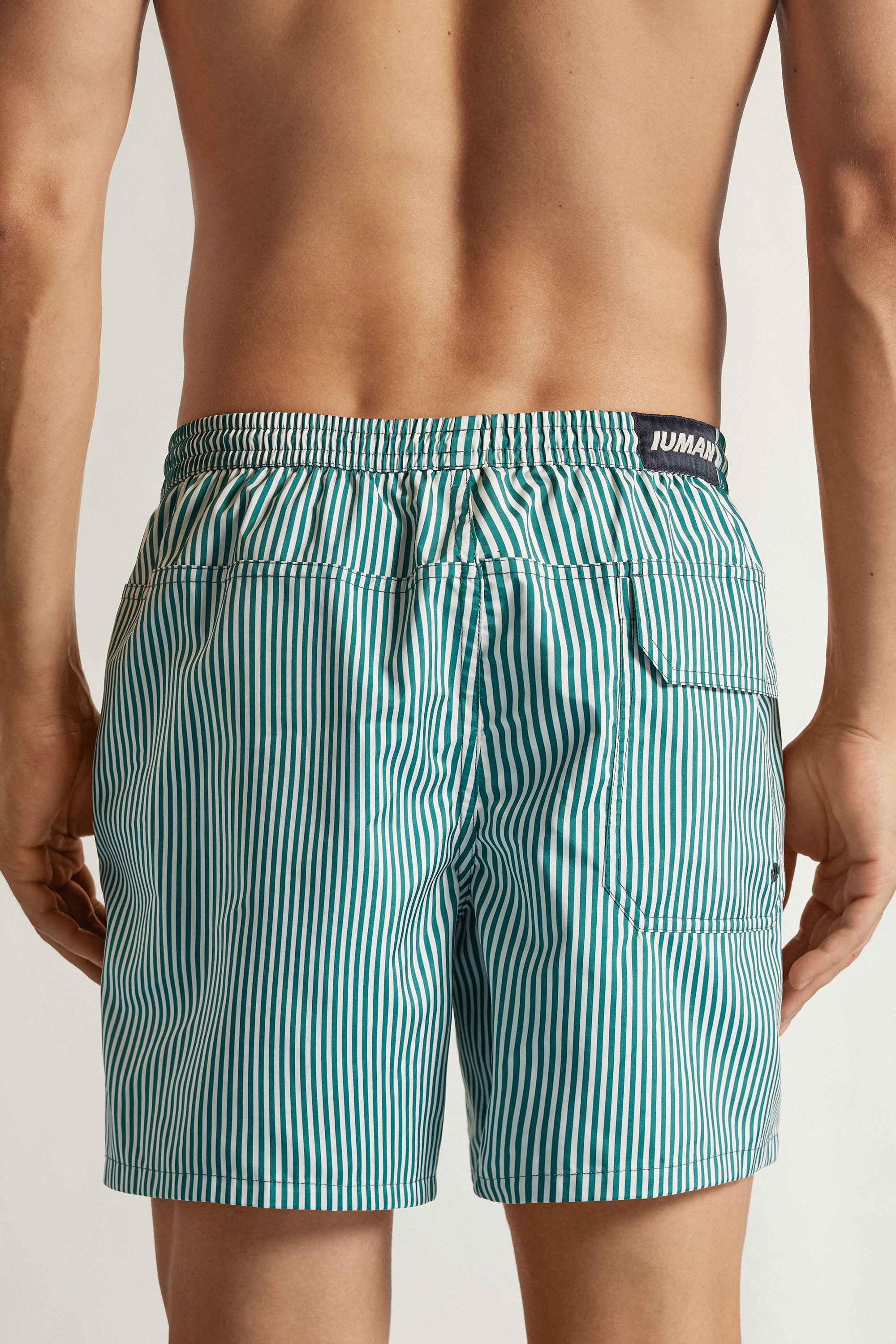 Alternative view of Reversible White/Green Swim Trunks